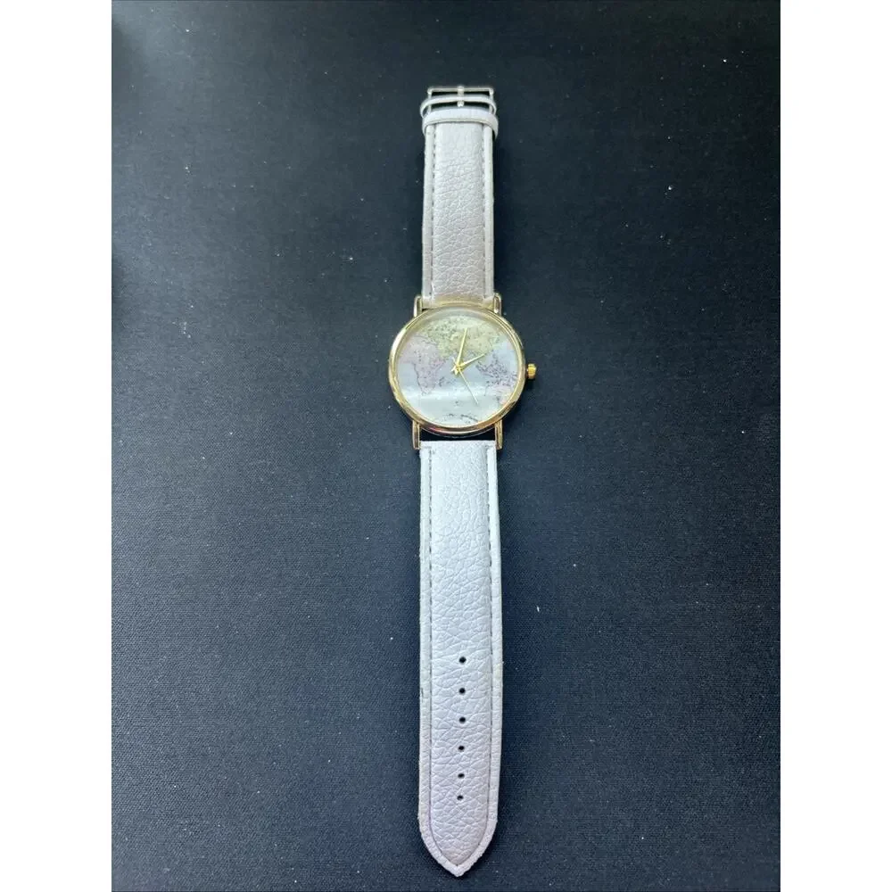 Eastern Hemisphere Gold Tone White Band Quartz Watch